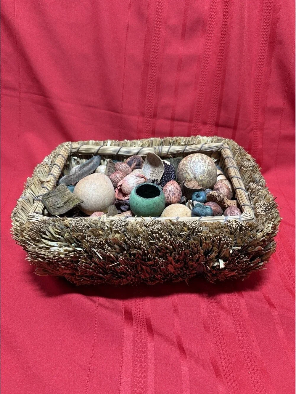 woven grass basket assortment of dried botanical potpourri